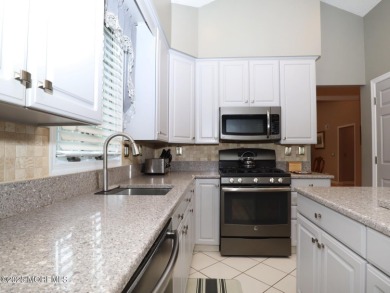 Step into effortless living in this move-in ready, meticulously on Greenbriar At Whittingham in New Jersey - for sale on GolfHomes.com, golf home, golf lot