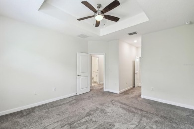 Welcome to this stunning townhome in the sought-after on ChampionsGate Golf Resort in Florida - for sale on GolfHomes.com, golf home, golf lot