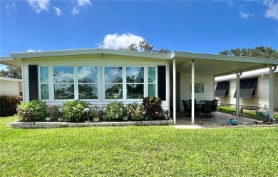 UNDENIABLY BEAUTIFUL HOME LOCATED DIRECTLY ON THE GOLF COURSE on Fairway Village Golf Course in Florida - for sale on GolfHomes.com, golf home, golf lot
