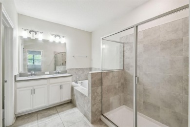 Welcome to this stunning townhome in the sought-after on ChampionsGate Golf Resort in Florida - for sale on GolfHomes.com, golf home, golf lot
