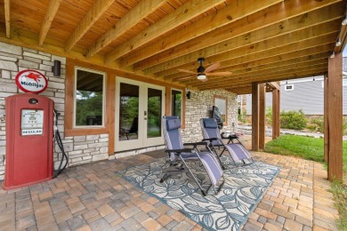 This Luxury Upscale Custom Lakefront Log  Stone Home invites you on Tellico Village -The Links At Kahite Golf Course in Tennessee - for sale on GolfHomes.com, golf home, golf lot