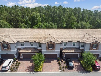 Welcome to this stunning townhome in the sought-after on ChampionsGate Golf Resort in Florida - for sale on GolfHomes.com, golf home, golf lot