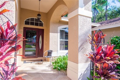 GORGEOUS 3 BEDROOM - 2 BATH - 2 CAR GARAGE POOL HOME AT THE on Tarpon Woods Golf Club in Florida - for sale on GolfHomes.com, golf home, golf lot