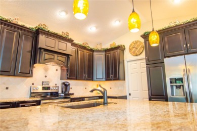 GORGEOUS 3 BEDROOM - 2 BATH - 2 CAR GARAGE POOL HOME AT THE on Tarpon Woods Golf Club in Florida - for sale on GolfHomes.com, golf home, golf lot