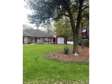 Charming brick home in this Leon Howard designed golf course on Holly Lake Ranch Golf Club in Texas - for sale on GolfHomes.com, golf home, golf lot