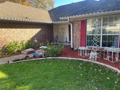 Charming brick home in this Leon Howard designed golf course on Holly Lake Ranch Golf Club in Texas - for sale on GolfHomes.com, golf home, golf lot