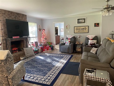 Charming brick home in this Leon Howard designed golf course on Holly Lake Ranch Golf Club in Texas - for sale on GolfHomes.com, golf home, golf lot