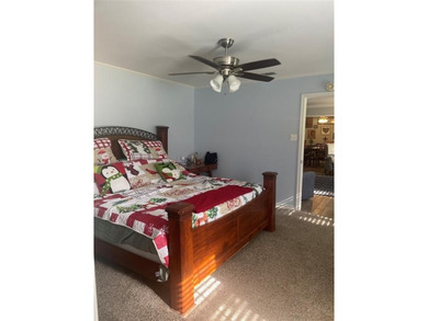 Charming brick home in this Leon Howard designed golf course on Holly Lake Ranch Golf Club in Texas - for sale on GolfHomes.com, golf home, golf lot