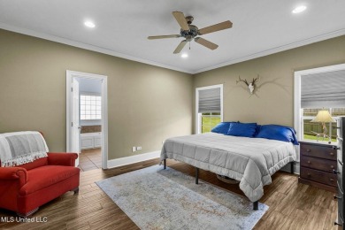 This 4 bedroom, 2 bath home is full of charm and space for the on Lake Caroline Golf Club in Mississippi - for sale on GolfHomes.com, golf home, golf lot