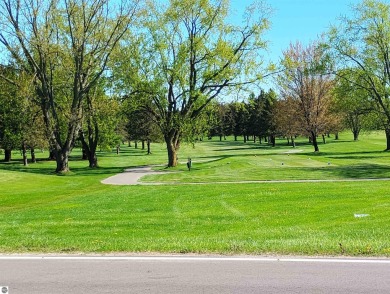 Beautiful lot at all sports private Lake Isabella with road on The Pines Golf Course at Lake Isabella in Michigan - for sale on GolfHomes.com, golf home, golf lot