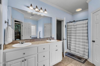 This 4 bedroom, 2 bath home is full of charm and space for the on Lake Caroline Golf Club in Mississippi - for sale on GolfHomes.com, golf home, golf lot