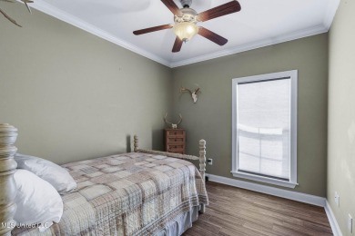 This 4 bedroom, 2 bath home is full of charm and space for the on Lake Caroline Golf Club in Mississippi - for sale on GolfHomes.com, golf home, golf lot