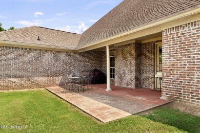 This 4 bedroom, 2 bath home is full of charm and space for the on Lake Caroline Golf Club in Mississippi - for sale on GolfHomes.com, golf home, golf lot