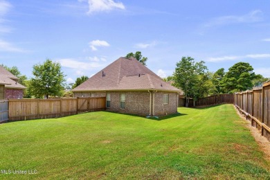 This 4 bedroom, 2 bath home is full of charm and space for the on Lake Caroline Golf Club in Mississippi - for sale on GolfHomes.com, golf home, golf lot