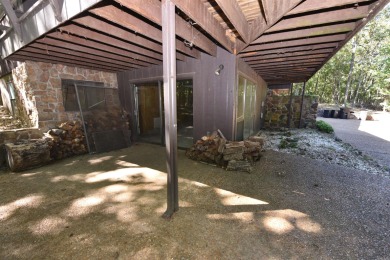 Charming Fixer-Upper with Endless Potential Near Fairfield Bay on Mountain Ranch Golf Club in Arkansas - for sale on GolfHomes.com, golf home, golf lot