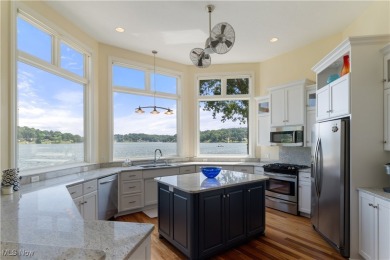 Live the lakefront dream at this exceptional 4-bedroom, 5.5-bath on Lake Mohawk Golf Club in Ohio - for sale on GolfHomes.com, golf home, golf lot