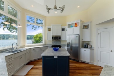Live the lakefront dream at this exceptional 4-bedroom, 5.5-bath on Lake Mohawk Golf Club in Ohio - for sale on GolfHomes.com, golf home, golf lot