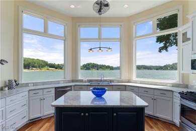 Live the lakefront dream at this exceptional 4-bedroom, 5.5-bath on Lake Mohawk Golf Club in Ohio - for sale on GolfHomes.com, golf home, golf lot