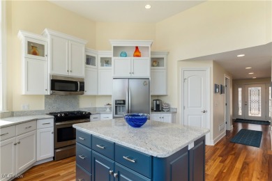 Live the lakefront dream at this exceptional 4-bedroom, 5.5-bath on Lake Mohawk Golf Club in Ohio - for sale on GolfHomes.com, golf home, golf lot