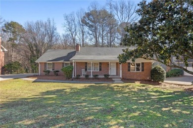 This beautifully remodeled 3-bedroom, 2-bath brick ranch is the on Honey Creek Country Club in Georgia - for sale on GolfHomes.com, golf home, golf lot