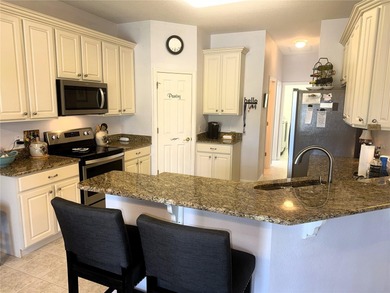 Under contract-accepting backup offers. ****WATERFRONT**** on Stonegate Golf Club in Florida - for sale on GolfHomes.com, golf home, golf lot