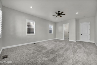 Stunning Gated Like-New Luxury Residence. Discover elevated on Somersett Country Club in Nevada - for sale on GolfHomes.com, golf home, golf lot