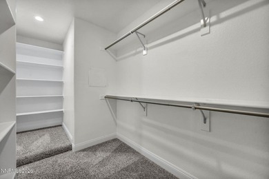 Stunning Gated Like-New Luxury Residence. Discover elevated on Somersett Country Club in Nevada - for sale on GolfHomes.com, golf home, golf lot