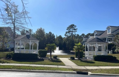 Interior designer's paradise! This spacious 2-story, 2-bedroom on International Club of Myrtle Beach in South Carolina - for sale on GolfHomes.com, golf home, golf lot