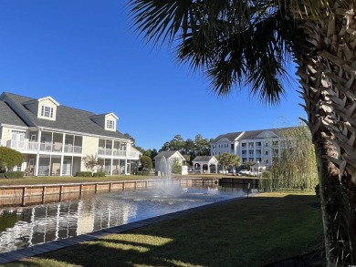 Interior designer's paradise! This spacious 2-story, 2-bedroom on International Club of Myrtle Beach in South Carolina - for sale on GolfHomes.com, golf home, golf lot