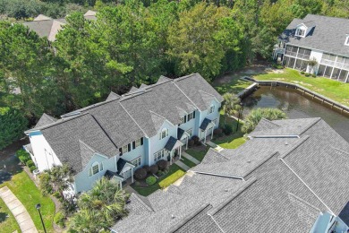 Interior designer's paradise! This spacious 2-story, 2-bedroom on International Club of Myrtle Beach in South Carolina - for sale on GolfHomes.com, golf home, golf lot