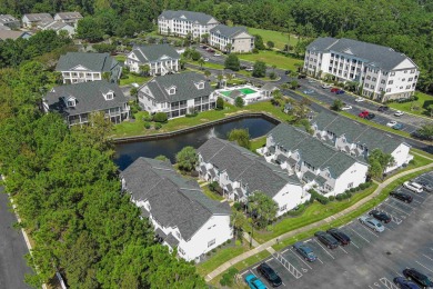 Interior designer's paradise! This spacious 2-story, 2-bedroom on International Club of Myrtle Beach in South Carolina - for sale on GolfHomes.com, golf home, golf lot