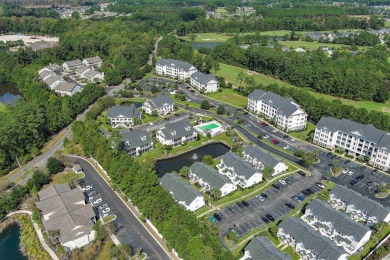 Interior designer's paradise! This spacious 2-story, 2-bedroom on International Club of Myrtle Beach in South Carolina - for sale on GolfHomes.com, golf home, golf lot