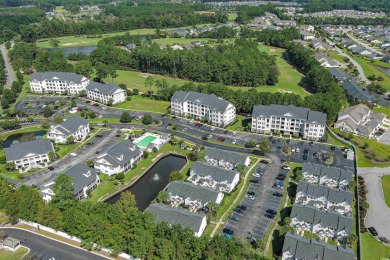 Interior designer's paradise! This spacious 2-story, 2-bedroom on International Club of Myrtle Beach in South Carolina - for sale on GolfHomes.com, golf home, golf lot