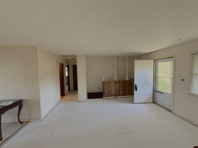 This charming 2-bedroom, 1-bath home is located in a peaceful on The Course At Turkey Mountain in Arkansas - for sale on GolfHomes.com, golf home, golf lot