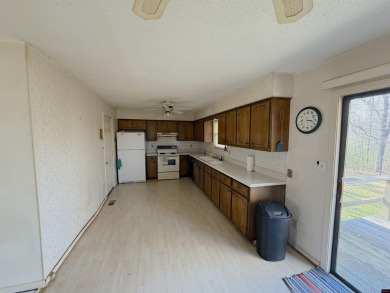 This charming 2-bedroom, 1-bath home is located in a peaceful on The Course At Turkey Mountain in Arkansas - for sale on GolfHomes.com, golf home, golf lot