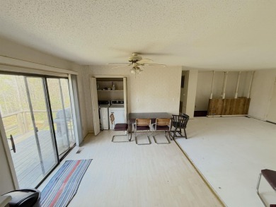 This charming 2-bedroom, 1-bath home is located in a peaceful on The Course At Turkey Mountain in Arkansas - for sale on GolfHomes.com, golf home, golf lot