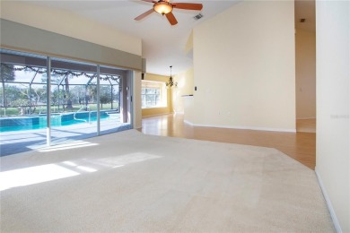 One or more photo(s) has been virtually staged. Fabulous pool on Caloosa Greens Executive Golf Course in Florida - for sale on GolfHomes.com, golf home, golf lot