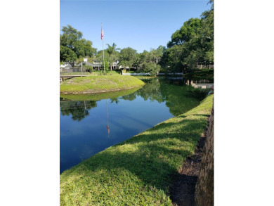 Under contract-accepting backup offers. Welcome to this charming on Carrollwood Country Club in Florida - for sale on GolfHomes.com, golf home, golf lot