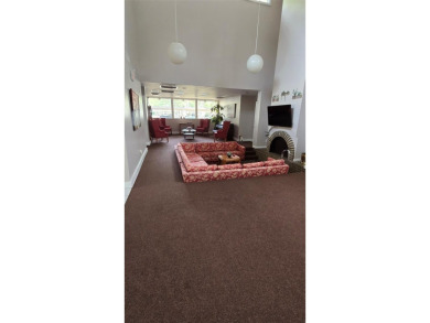 Under contract-accepting backup offers. Welcome to this charming on Carrollwood Country Club in Florida - for sale on GolfHomes.com, golf home, golf lot