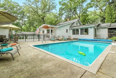 Beach vibes and vintage charm in this historic Grand Beach home on Grand Beach Municipal Golf Course in Michigan - for sale on GolfHomes.com, golf home, golf lot