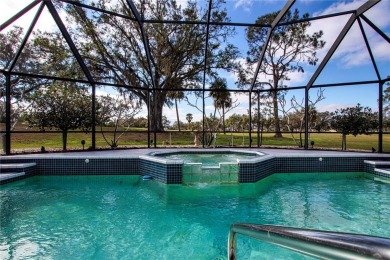 One or more photo(s) has been virtually staged. Fabulous pool on Caloosa Greens Executive Golf Course in Florida - for sale on GolfHomes.com, golf home, golf lot