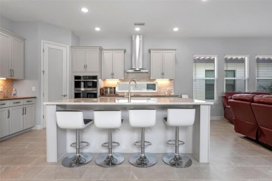 Located in the sought-after guard-gated community of Providence on Providence Golf Club in Florida - for sale on GolfHomes.com, golf home, golf lot