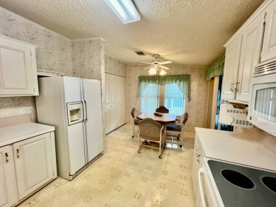 SELLER IS MOTIVATED!! Home is located in Water Oak Country Club on Water Oak Country Club Estates in Florida - for sale on GolfHomes.com, golf home, golf lot