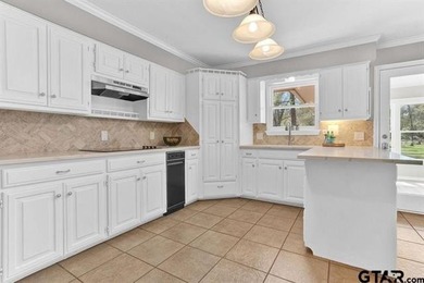 This beautifully maintained traditional-style home offers 3 on Hide-A-Way Lake Golf Course in Texas - for sale on GolfHomes.com, golf home, golf lot