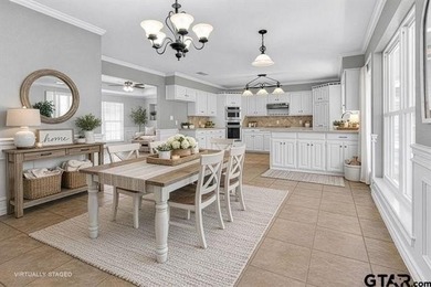 This beautifully maintained traditional-style home offers 3 on Hide-A-Way Lake Golf Course in Texas - for sale on GolfHomes.com, golf home, golf lot