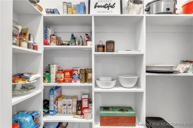 Welcome to 1534 Delaware Place! This incredible single-story on Carolina Trace Country Club in North Carolina - for sale on GolfHomes.com, golf home, golf lot