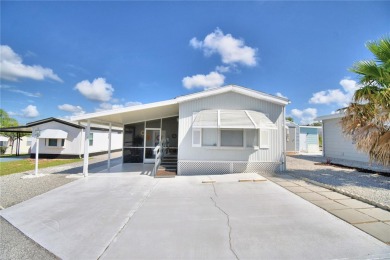 PRICE IMPROVEMENT...WELCOME TO YOUR FLORIDA RETIREMENT OASIS IN on Southern Dunes Golf and Country Club in Florida - for sale on GolfHomes.com, golf home, golf lot