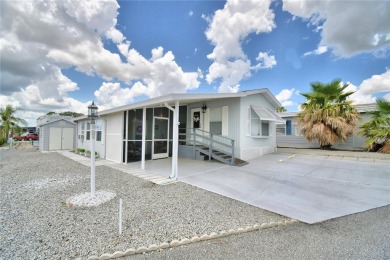 PRICE IMPROVEMENT...WELCOME TO YOUR FLORIDA RETIREMENT OASIS IN on Southern Dunes Golf and Country Club in Florida - for sale on GolfHomes.com, golf home, golf lot