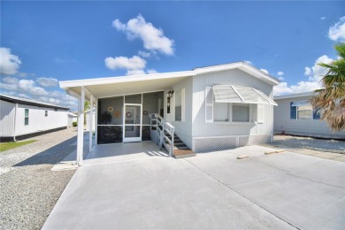 PRICE IMPROVEMENT...WELCOME TO YOUR FLORIDA RETIREMENT OASIS IN on Southern Dunes Golf and Country Club in Florida - for sale on GolfHomes.com, golf home, golf lot