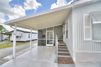 PRICE IMPROVEMENT...WELCOME TO YOUR FLORIDA RETIREMENT OASIS IN on Southern Dunes Golf and Country Club in Florida - for sale on GolfHomes.com, golf home, golf lot